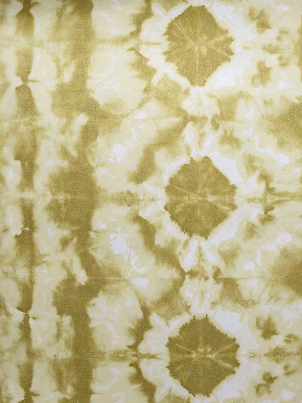 Batik fabric in green gold color - pattern number 26789 - by Galerie in the Crafted collection