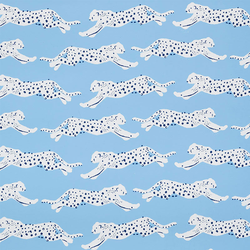 Leaping Leopards wallpaper in sky color - pattern number 5009590 - by Schumacher in the Small Print Wallpapers collection