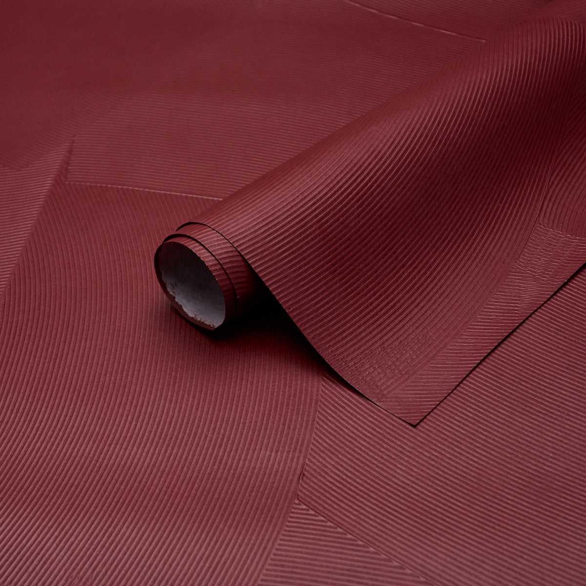 Hand Combed Plaster Wallpaper in oxblood color - pattern number 5013955 - by Schumacher in the David Kaihoi collection