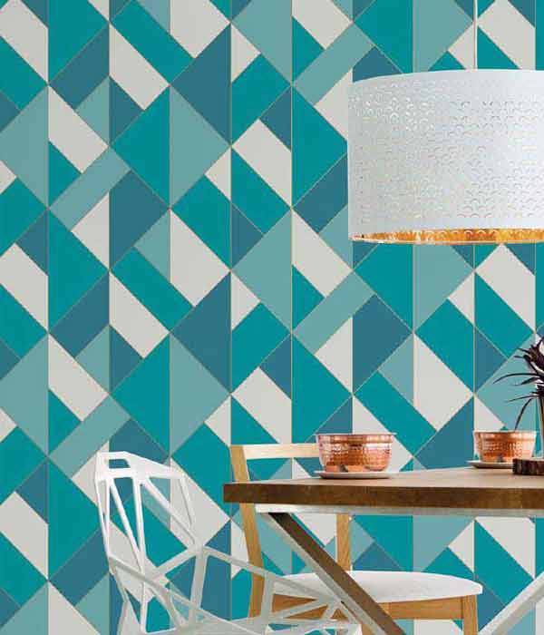 wall with teal and green geometric print wallpaper
