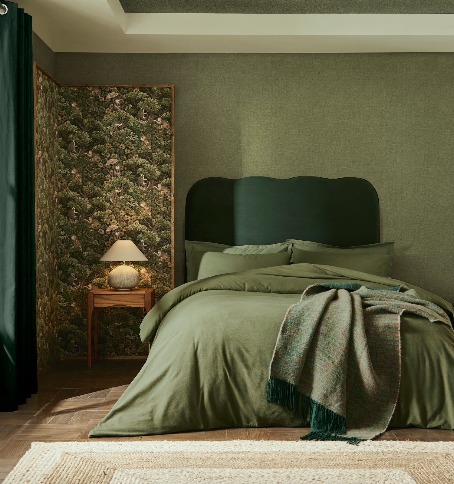 Treetop Troop Wallpaper in green color - pattern number 142310 - by Graham and Brown in the 2025 Exclusives collection