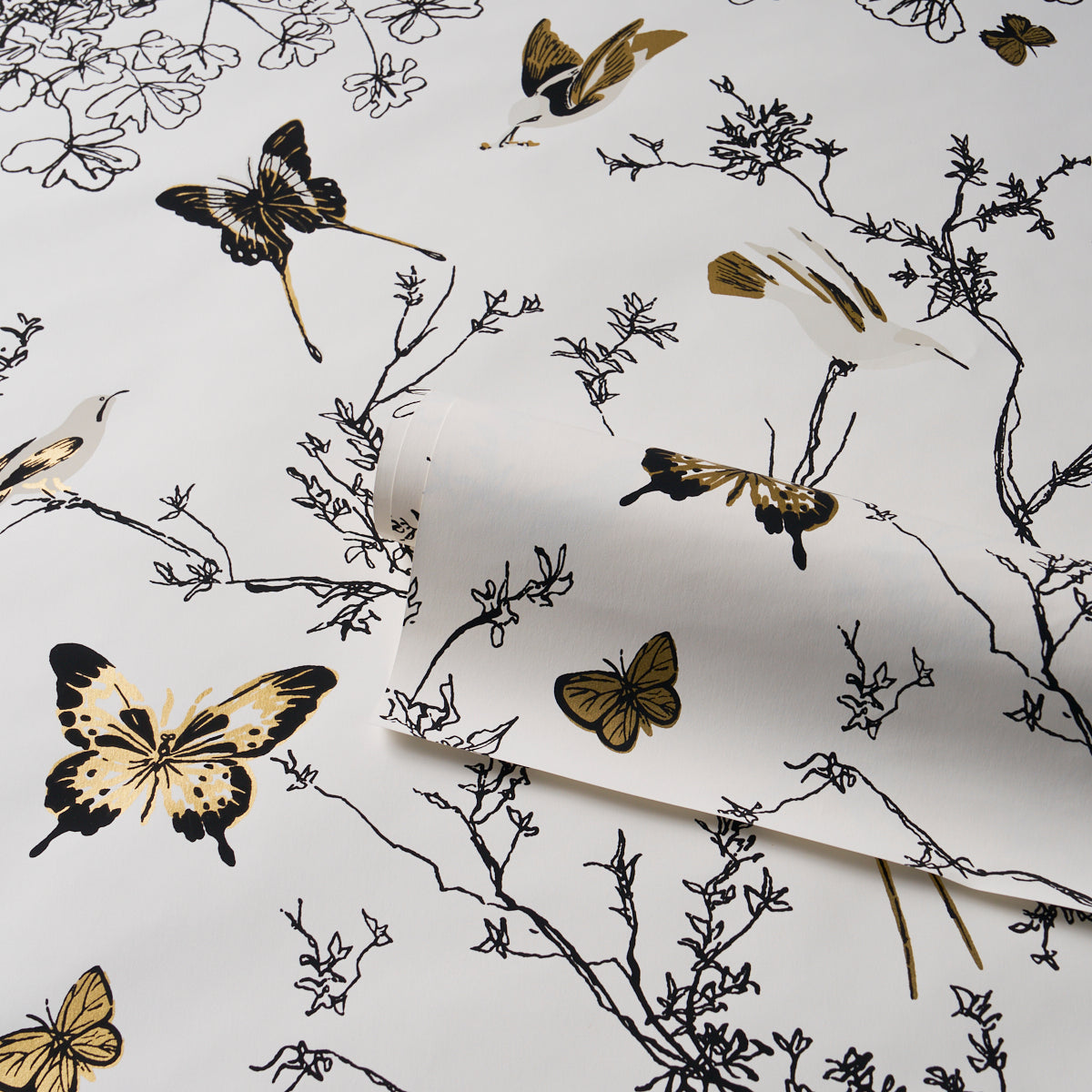 Birds and Butterflies Wallpaper in black and gold color - pattern number 2704424 - by Schumacher in the Perennial Favorites collection