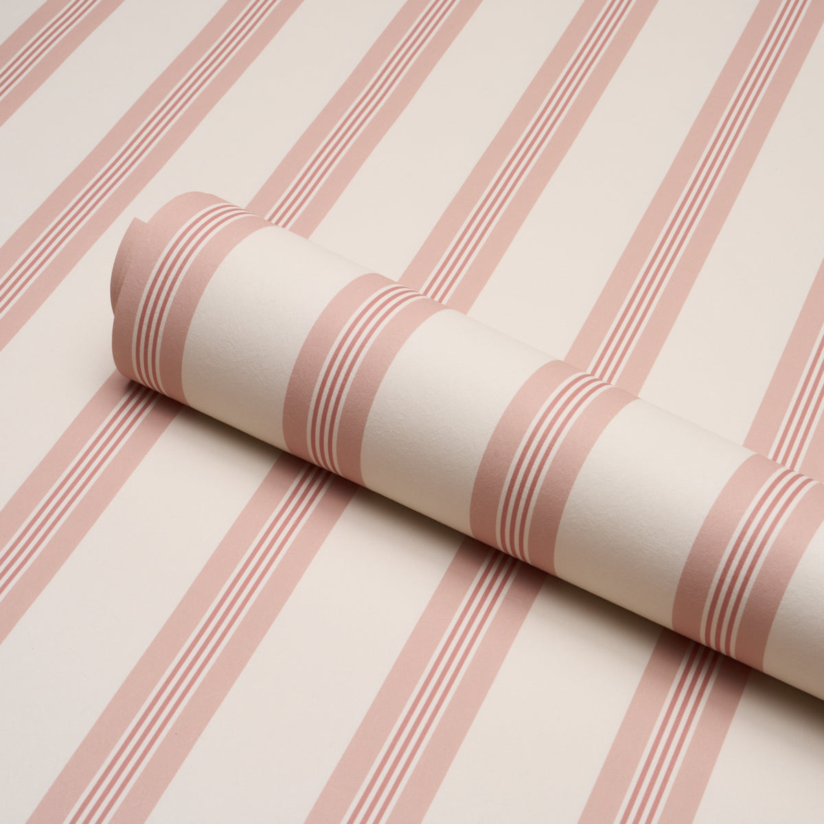 Chatham Stripe Wallpaper in rose color - pattern number 5018170 - by Schumacher in the Stripe Wallcovering Collection collection