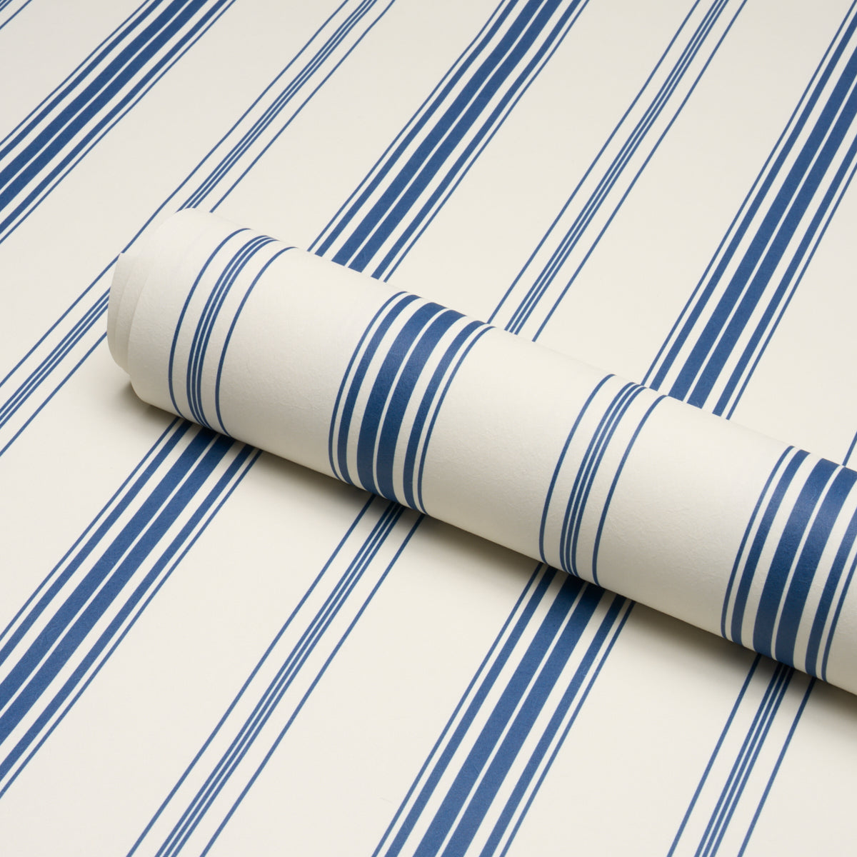 Coco Stripe Wallpaper in indigo color - pattern number 5018194 - by Schumacher in the Stripe Wallcovering Collection collection