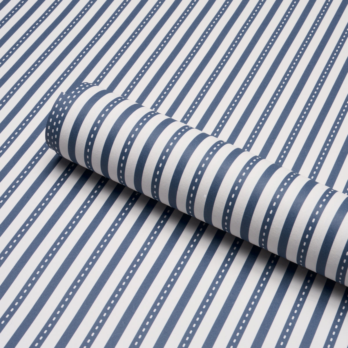Mathis Ticking Stripe Wallpaper in indigo color - pattern number 5018202 - by Schumacher in the Stripe Wallcovering Collection collection