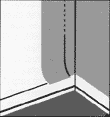 first of two illustration showing how to trim wallpaper around corners